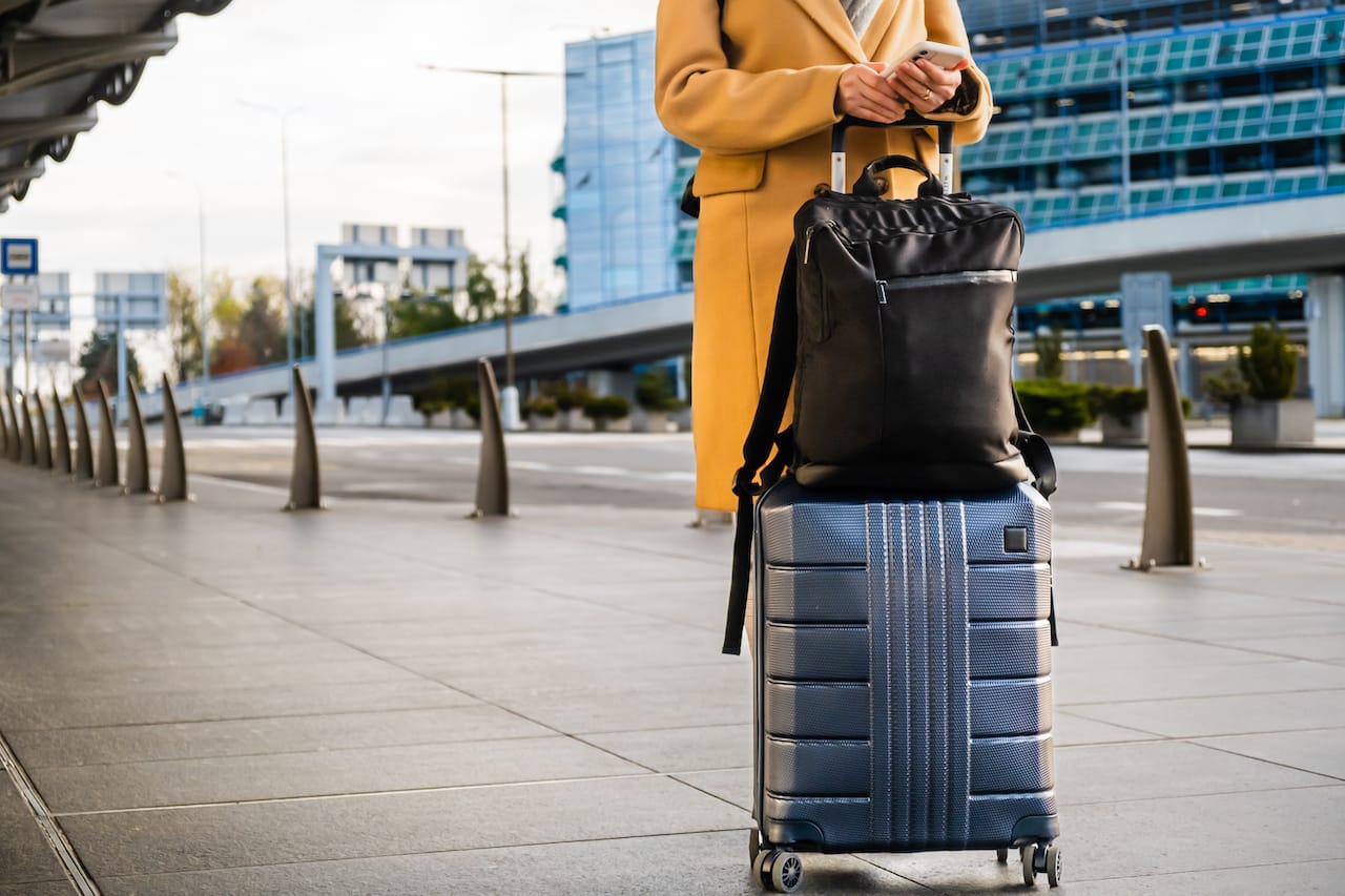 woman traveler in coat